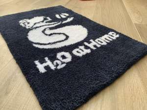 Tapis artisanaux avec la reproduction de votre logo